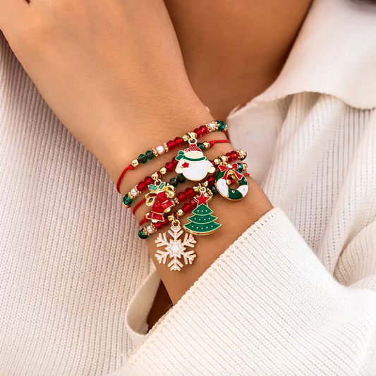 Armband "Christmas" Set of five delicate Christmas bracelets with festive charms: snowman, snowflake, Christmas bells, wreath, and Christmas tree